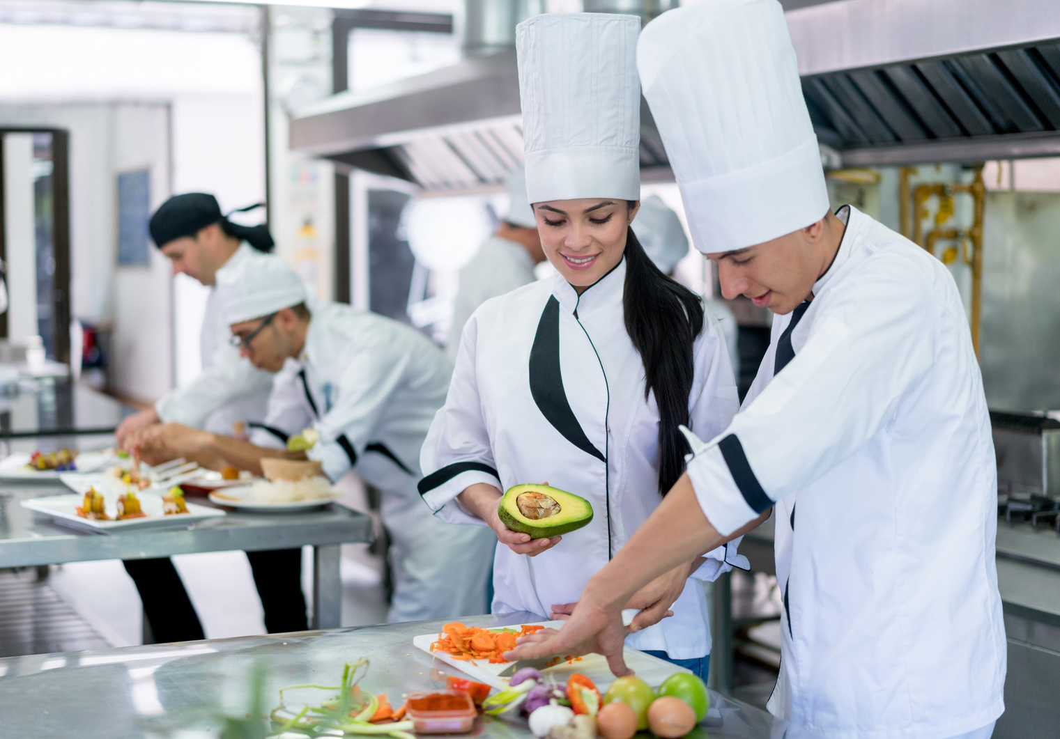 Group of chefs cooking